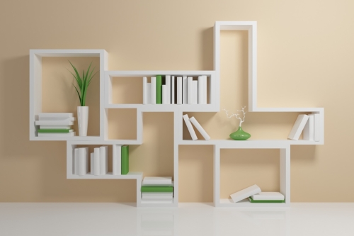 White,Bookshelf,With,A,White,And,Green,Books,Against,Beige
