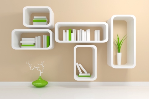 Modern,White,Bookshelf,With,A,White,And,Green,Books,Against